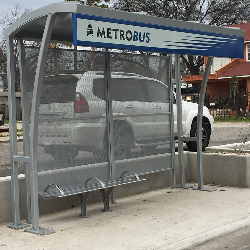 Metro bus shelter from the right side view with a bench for passengers
