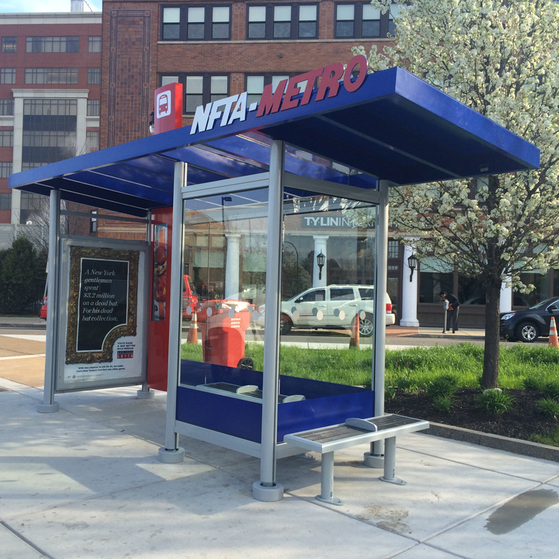NFTA Metro bus shelter with advertising display on the right side, bench seating inside and outside on the left