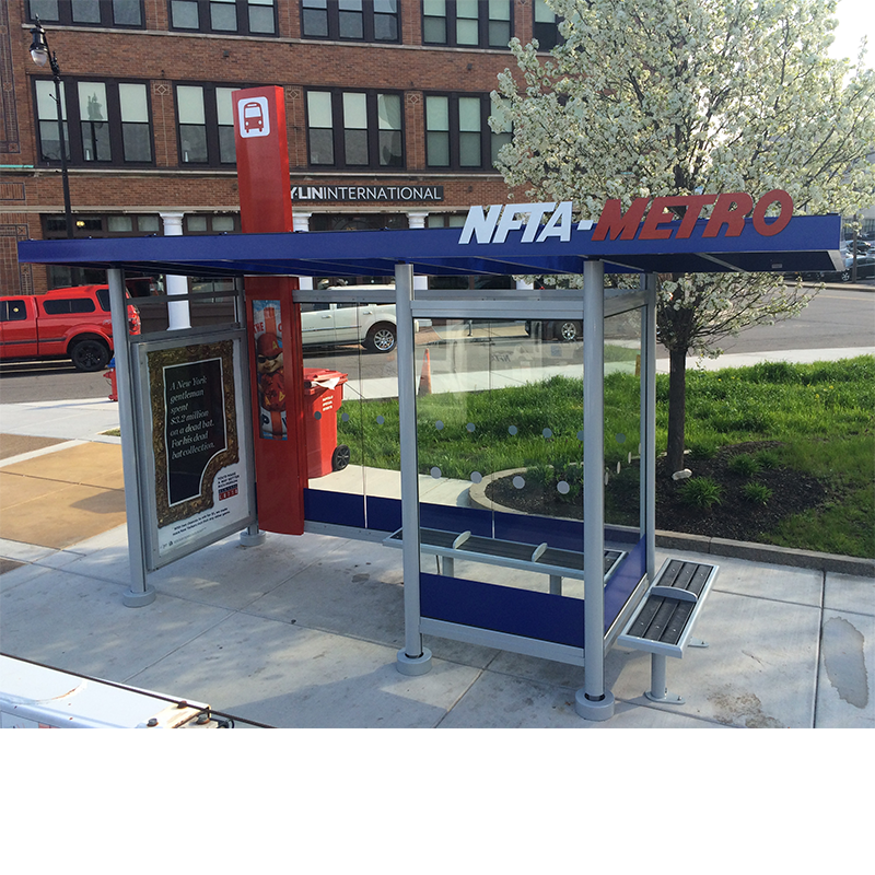 High up view of a bus shelter for NFTA Metro with advertising displays inside, a bench on the inside as well as one on the outside