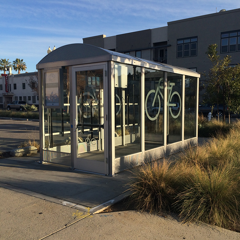 A fully enclosed bike shelter or locker for bikes to be stores hanging inside this shelter fully protected.