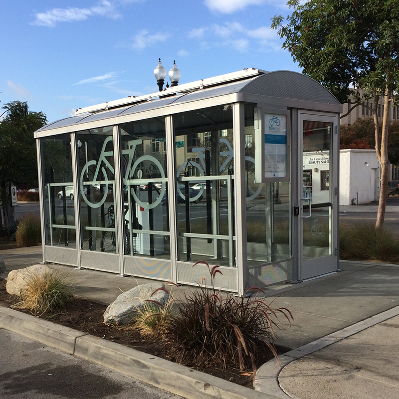 A fully enclosed bike shelter or locker for bikes to be stored hanging and fully protected.