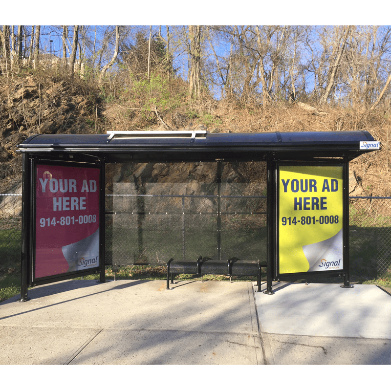 A sierra series bus shelter with bench seating for three and advertising displays on both side panels.