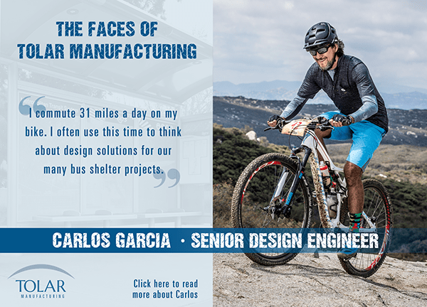 Face of Tolar - Carlos Garcia is seen riding a bike up a hill.