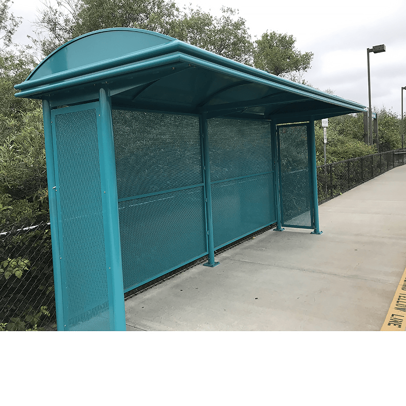 A Sierrna bus shelter with a bench on the outside left.