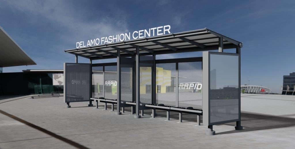 Del Amo Fashion Center bus shelter with a Rapid logo on the back panels, both side panels have a double sided advertising display and the stop name on top of the roof.