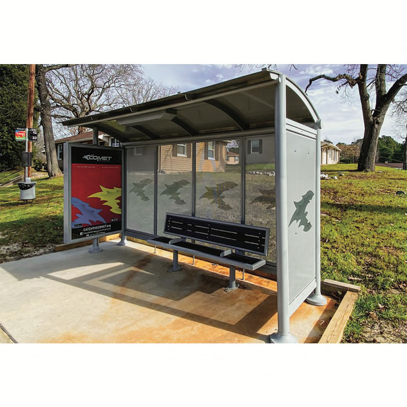 A left side view of a sunset bus shelter with bench seating, advertising display on the left and custom logo on each panel