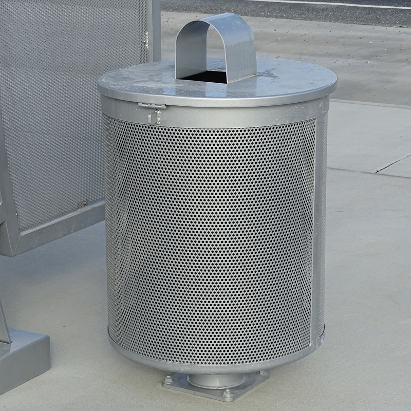A silver trash receptacle with a covered top with an arched opening to minimize trash disruption.
