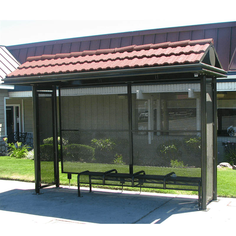 front view of a sierrna bus shelter with bench seating for our and a shingle roof