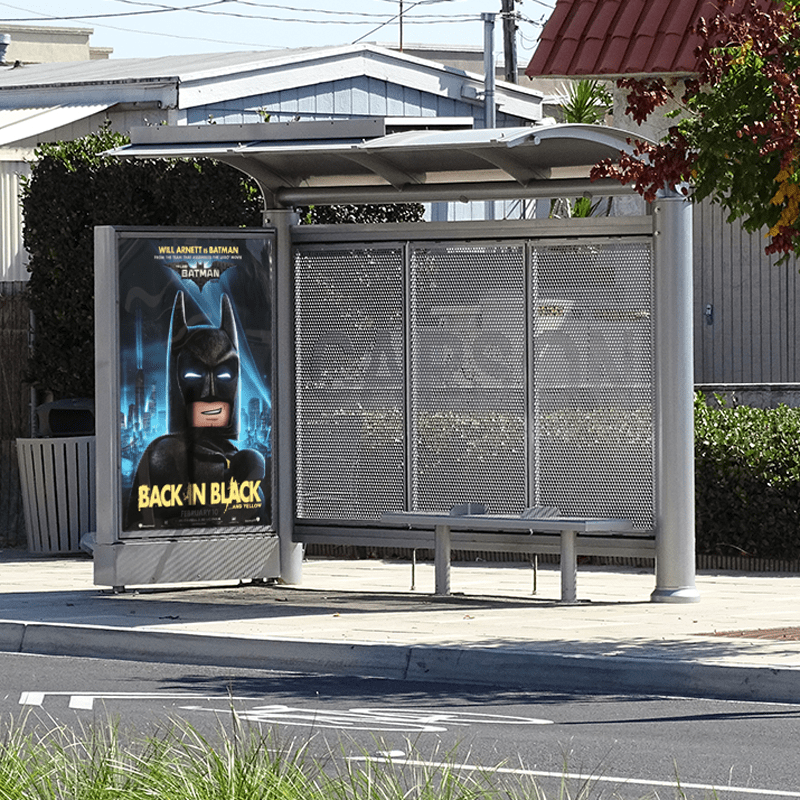 Left side view of a siga custom bus shelter with a double sided advertising display