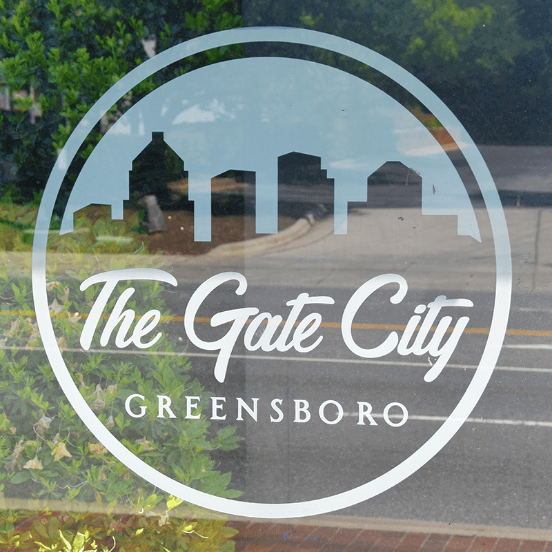 Greensboro city logo decal for their custom bus shelters