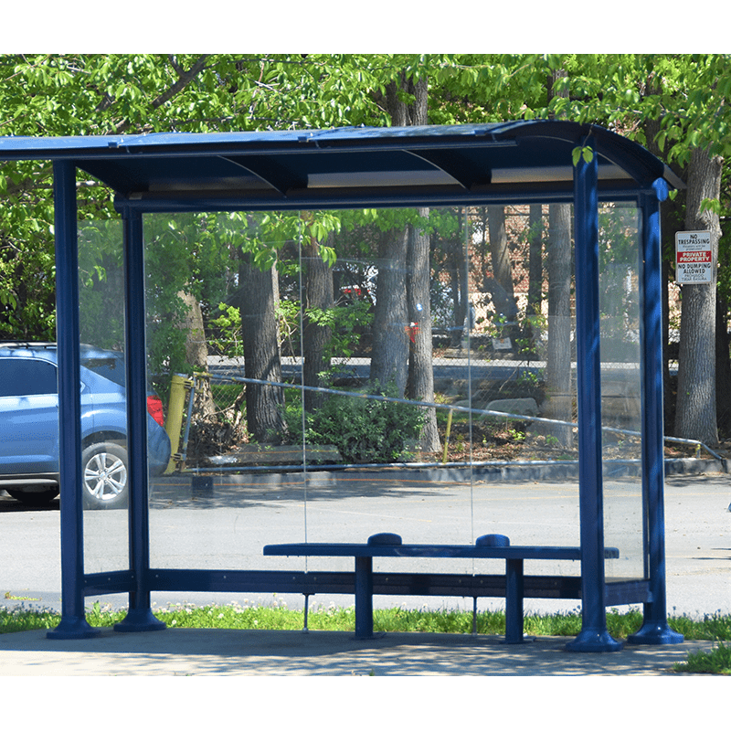 front view of a blue metal signa sunset bus station including a bench for three passengers
