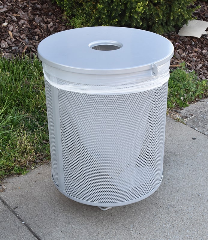 Side view of the trash receptacle from Tolar's street furniture products