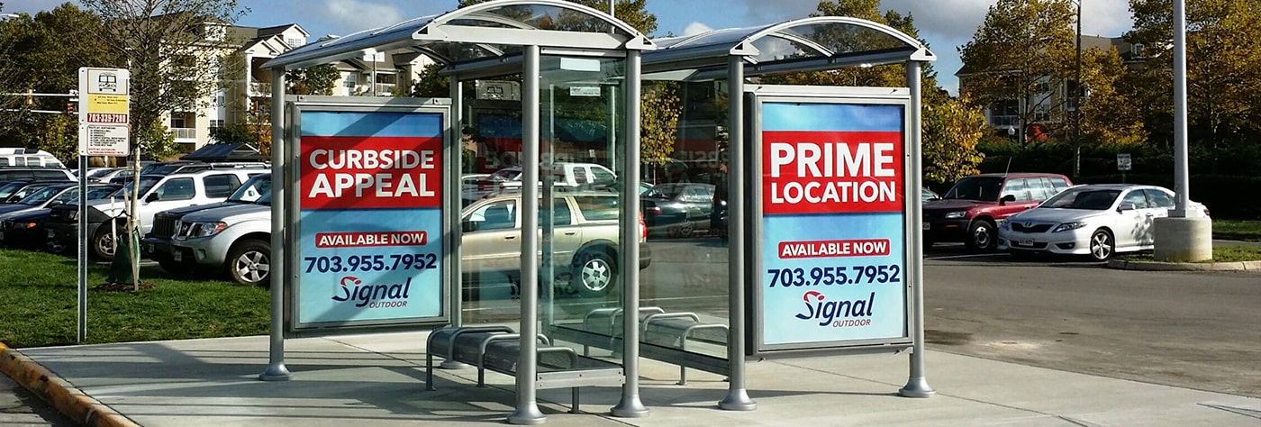 two back to back Euro Series Bus Shelter in Tysons Corner, VA with advertising displays on each and bench seating.