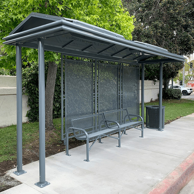 Sierra Series bus shelter with aluminum structure, bench seating and a trash receptacle