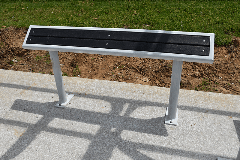 a front view of a standing bench for riders to lean on as they wait