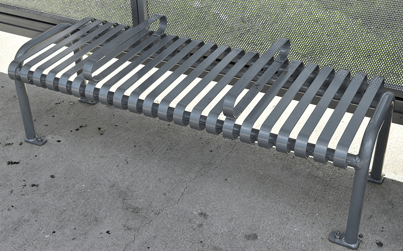 A three seat slatted bench is seen from the top.